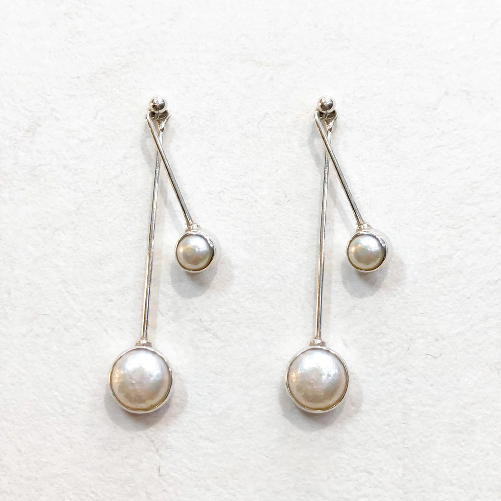 Aretes Gemelas