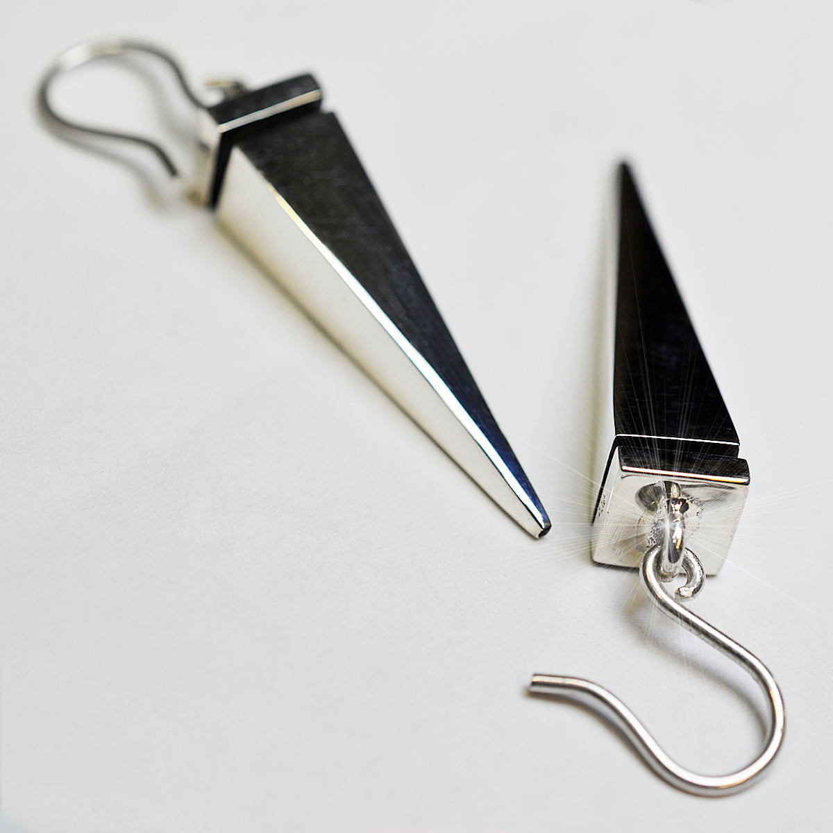 Aretes Péndulo