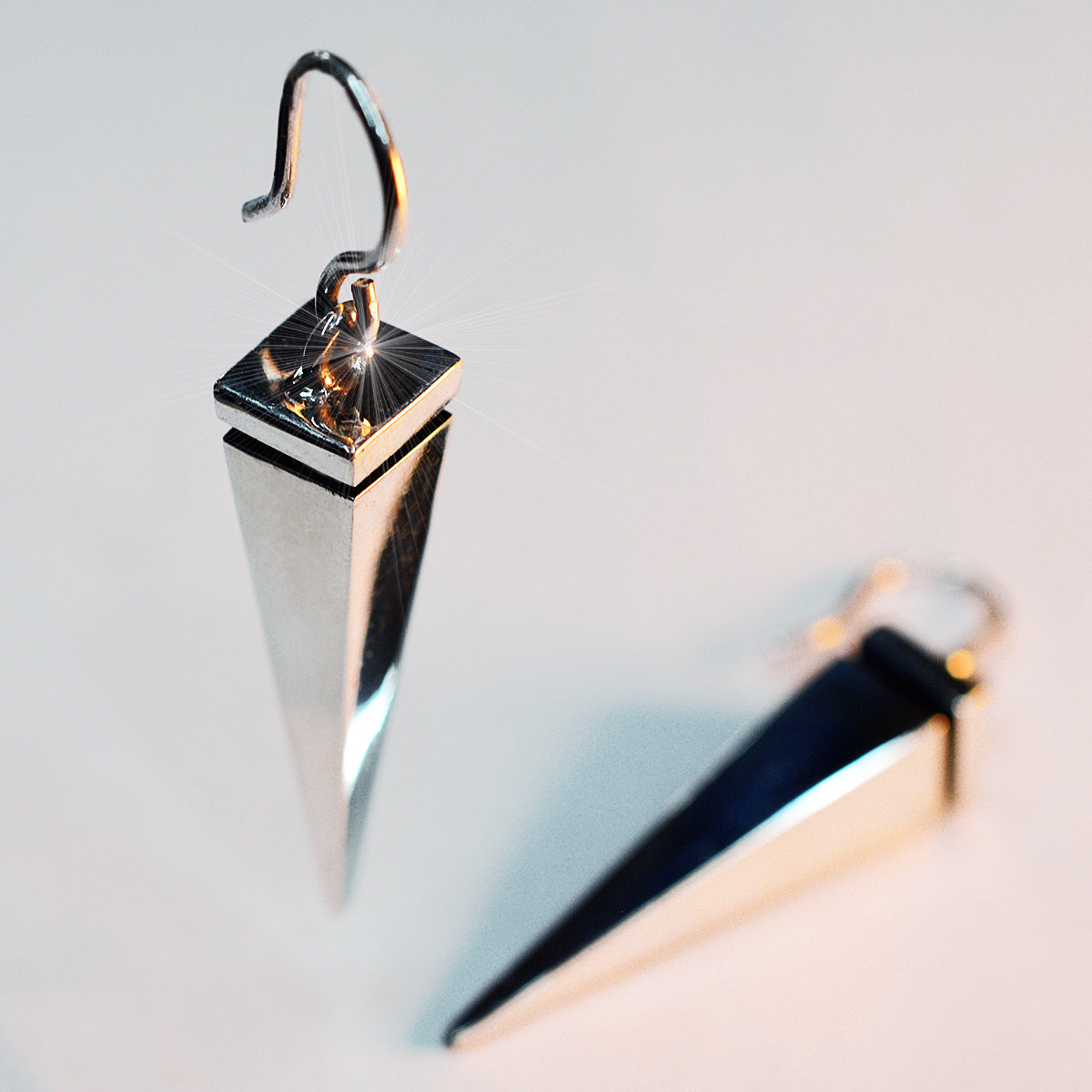 Aretes Péndulo