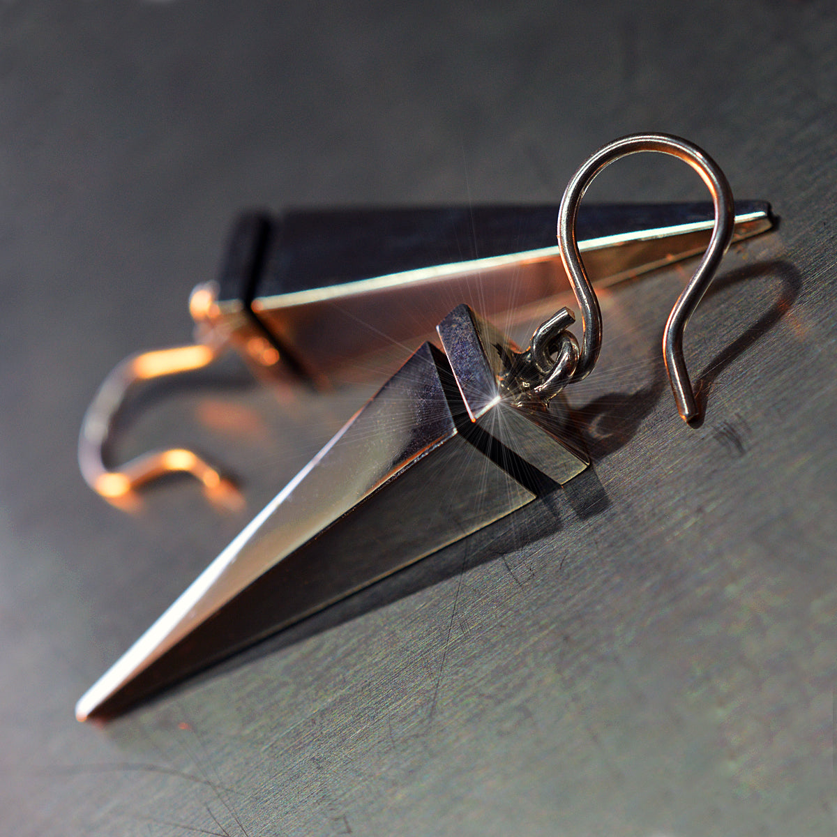 Aretes Péndulo