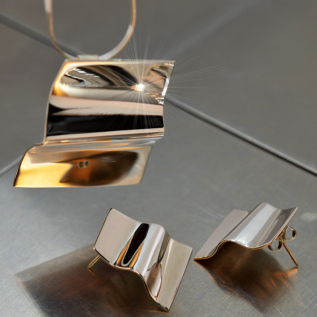 Dije & Aretes Argento