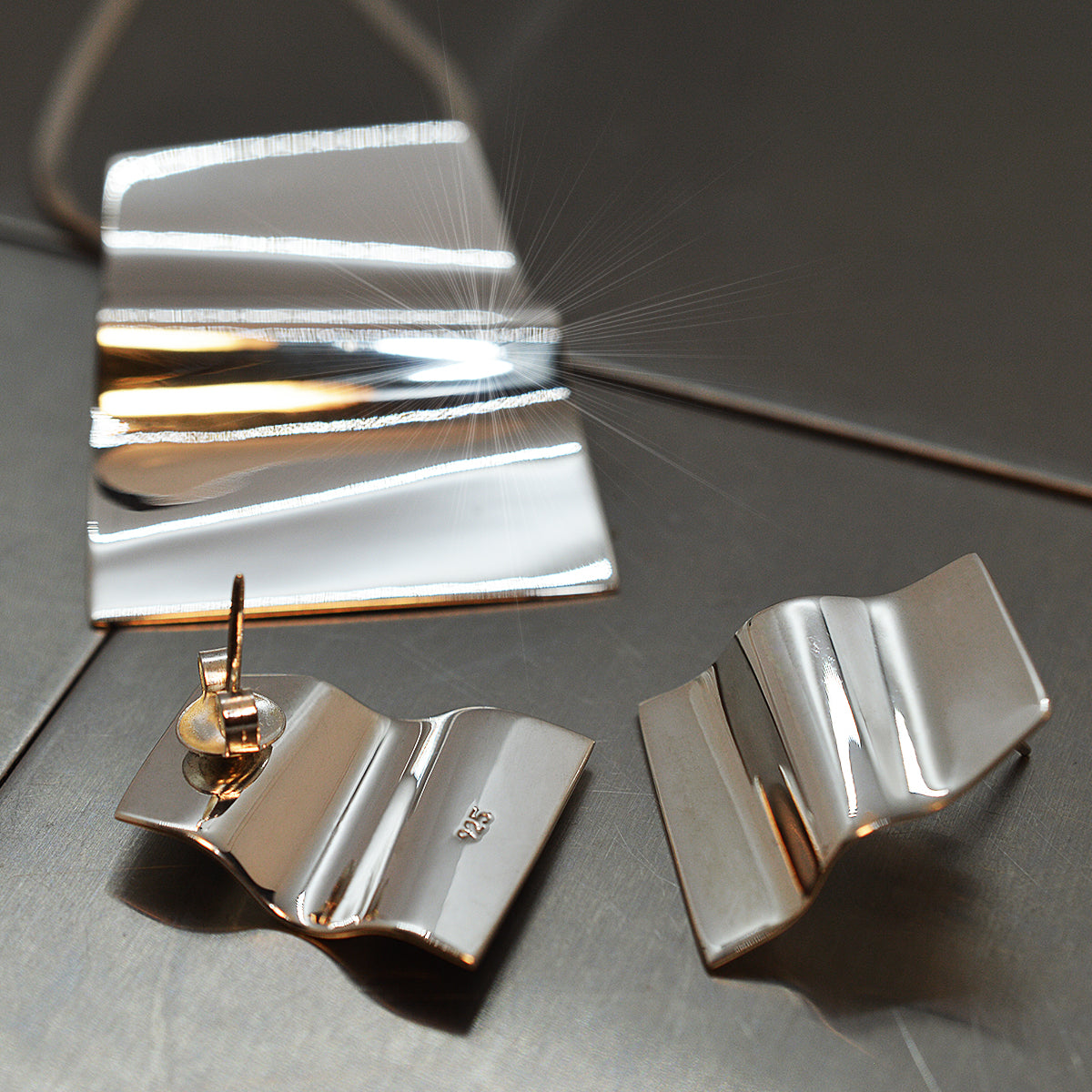 Dije & Aretes Argento