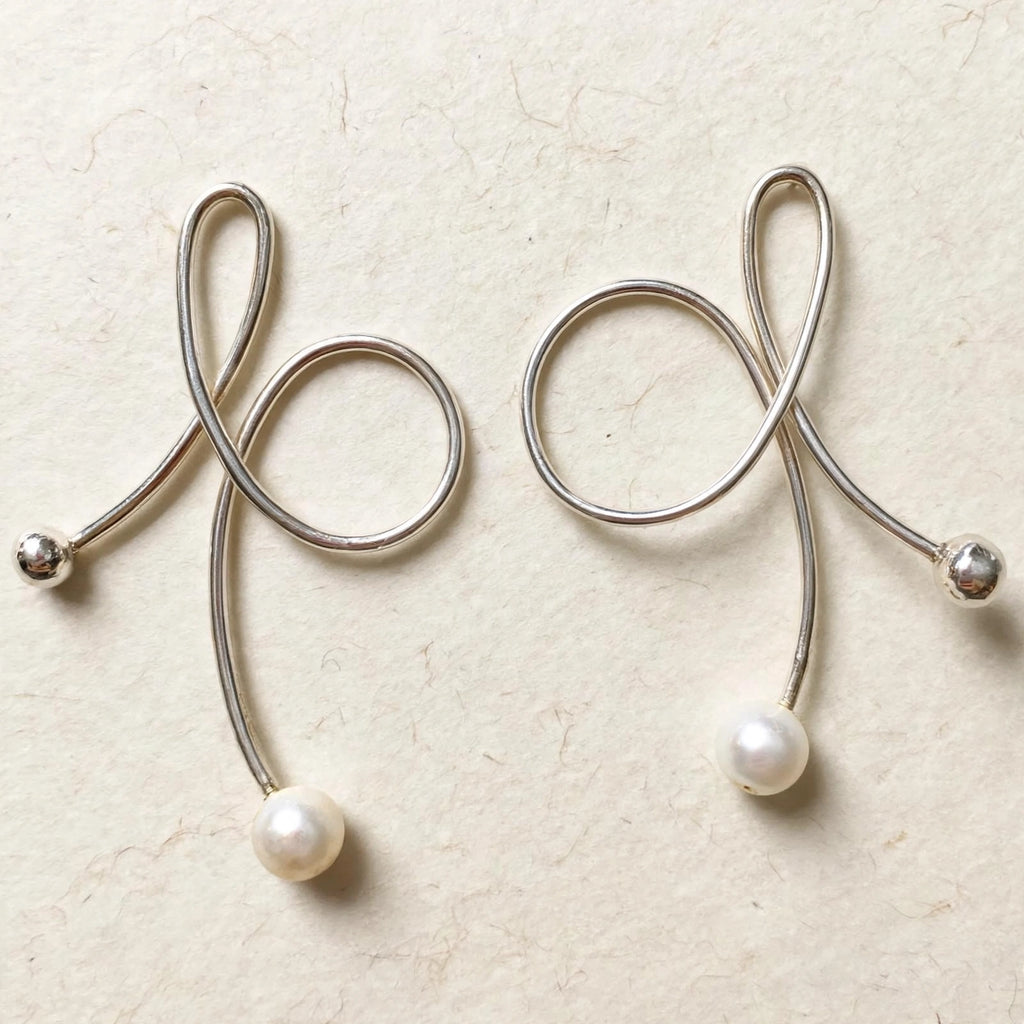 Aretes Rizo