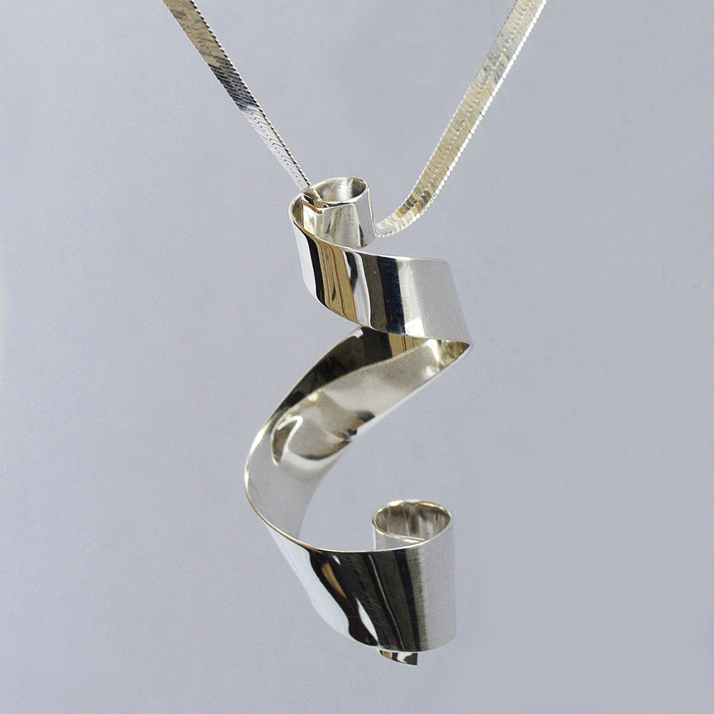 Dije & Aretes Enredo