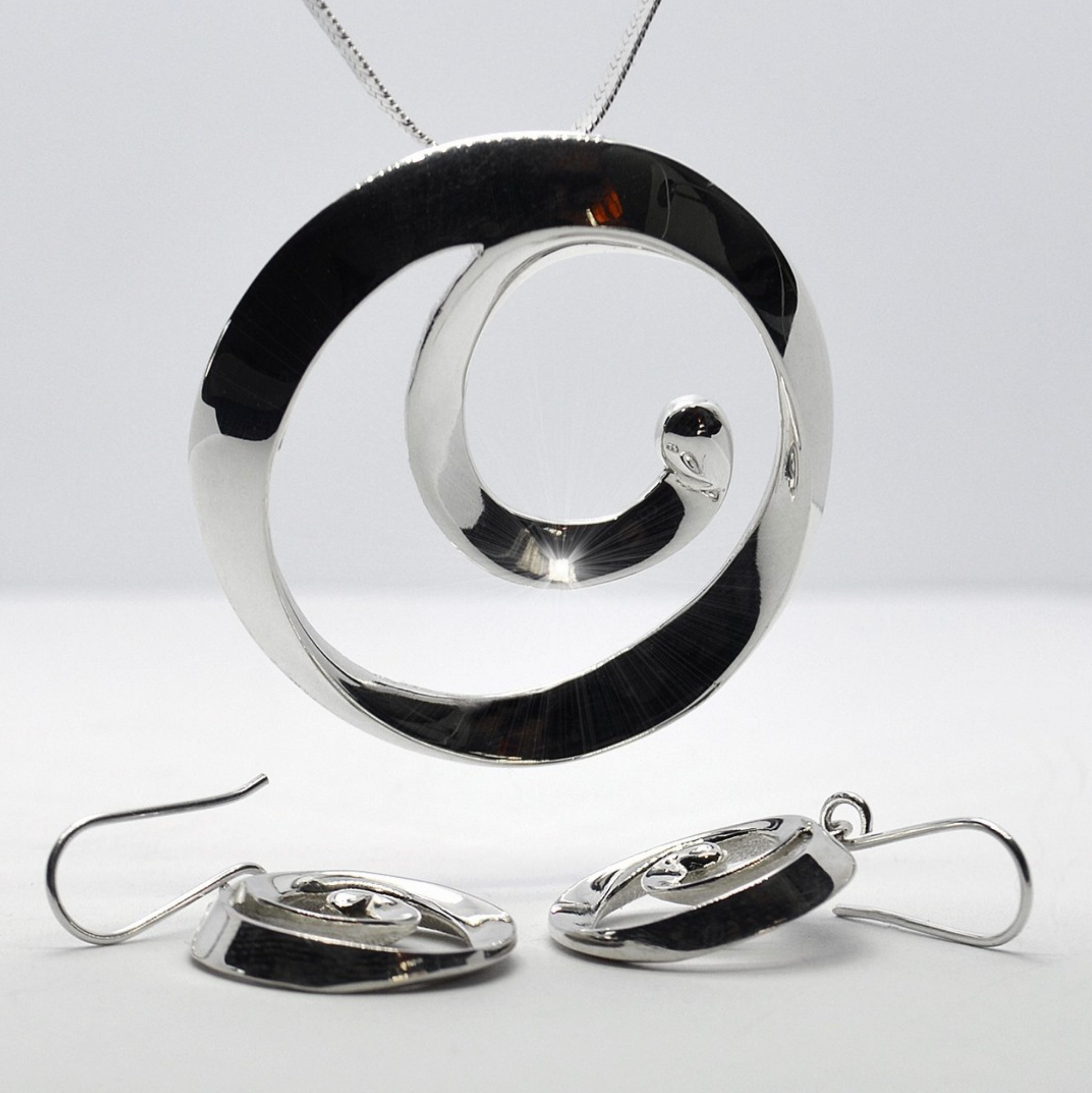Dije & Aretes Atmósfera