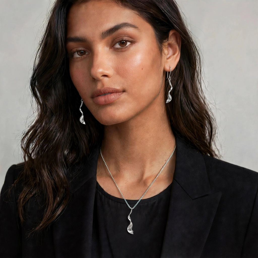 Dije y Aretes Torbellino