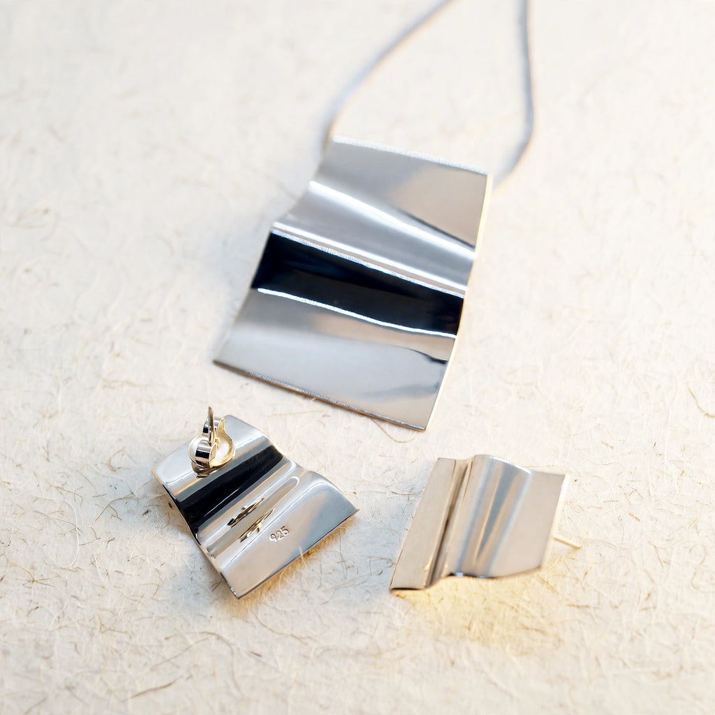 Dije y aretes de plata
