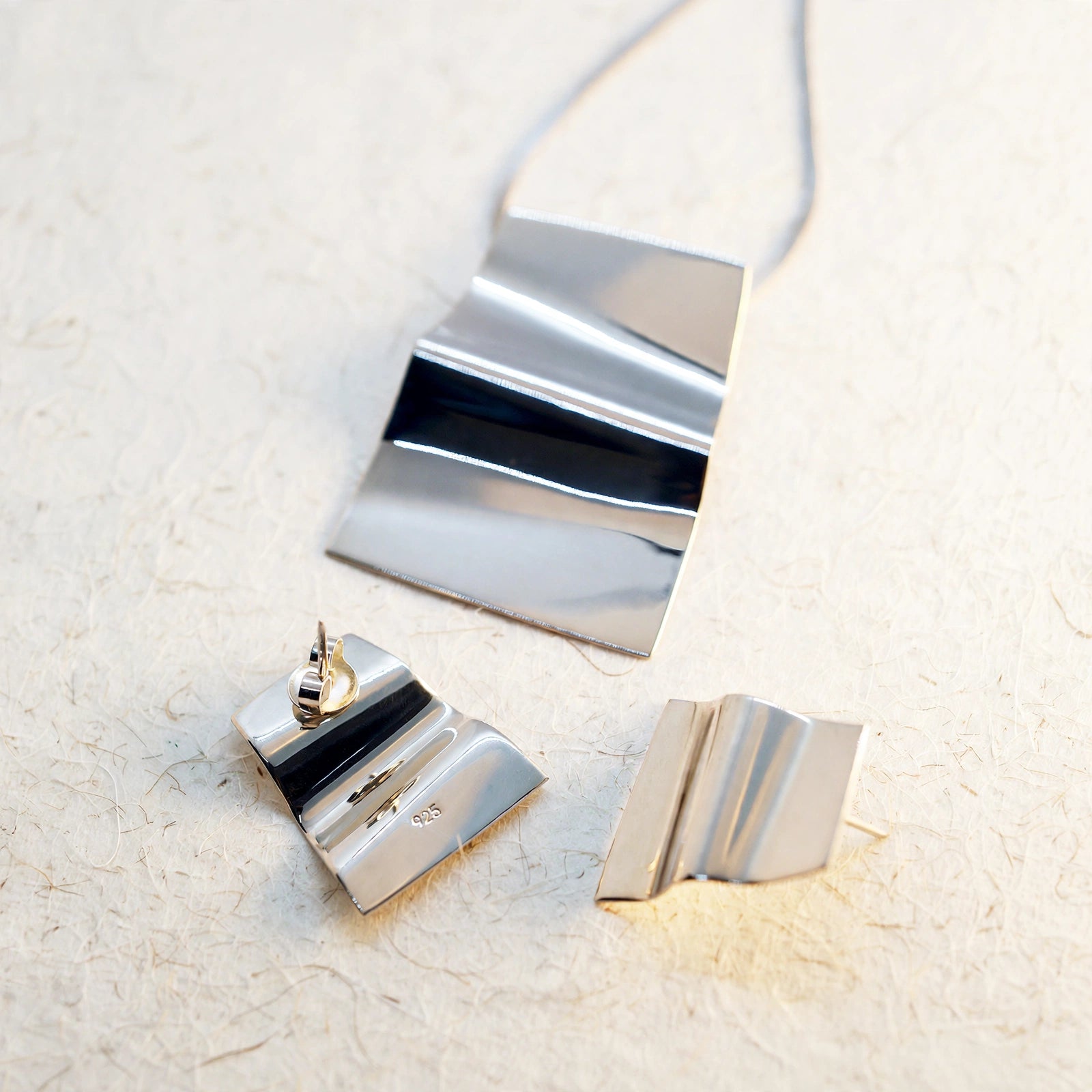 Dije y aretes de plata