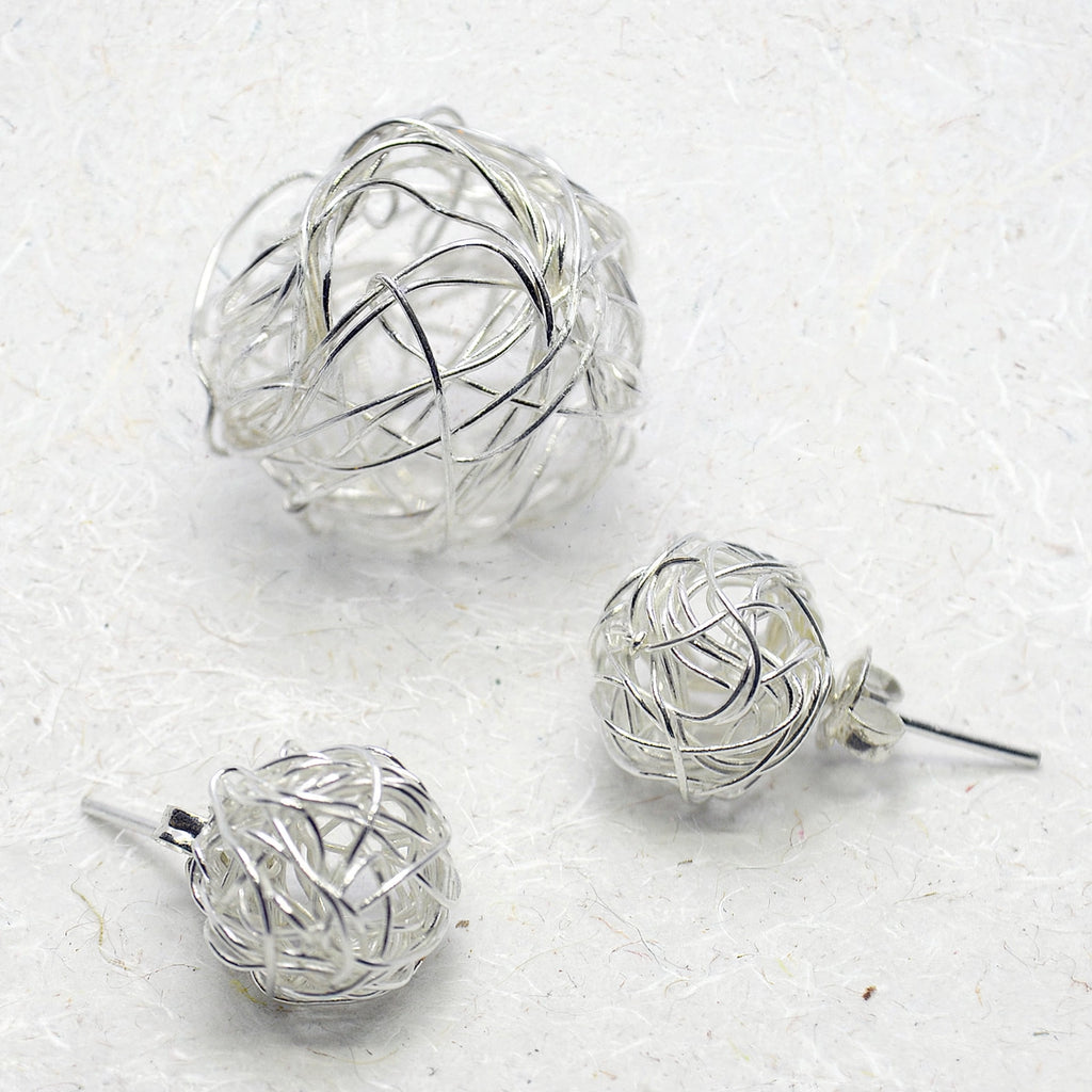 Dije y aretes Estambre