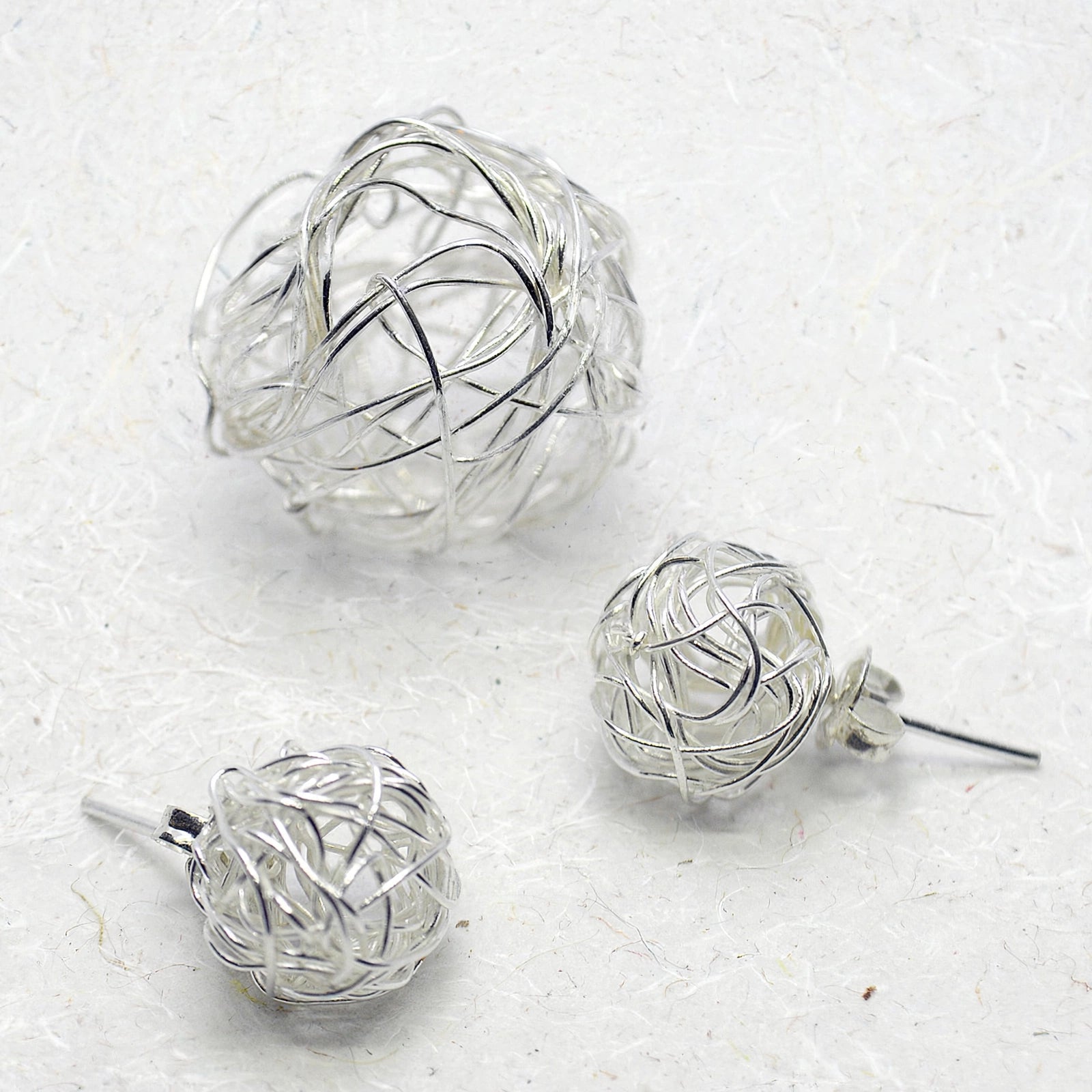 Dije y aretes Estambre