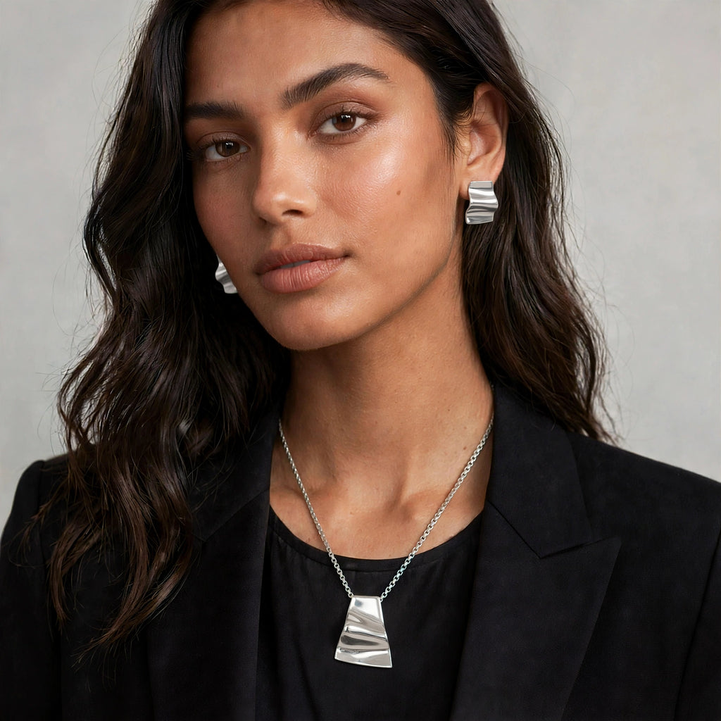 Dije y aretes de plata